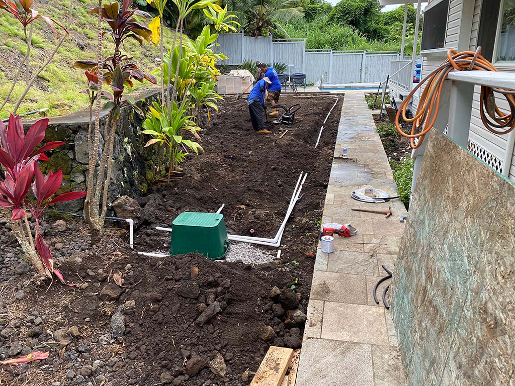 spinkler system being installed by local landscapers, Hawaii.