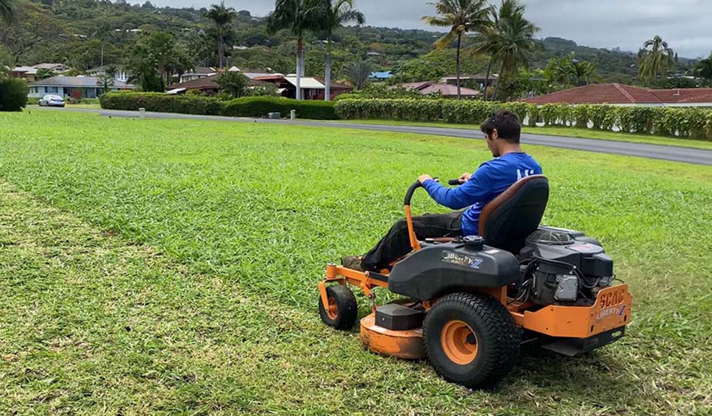big island landscaping services near Kona. mowing lawn on Hawaii with a zero turn mower.