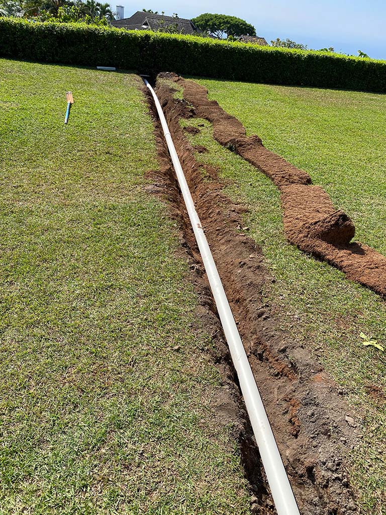 Irrigation pipe installation, Kona landscaping. Hawaii sprinkler installation and irrigation services.