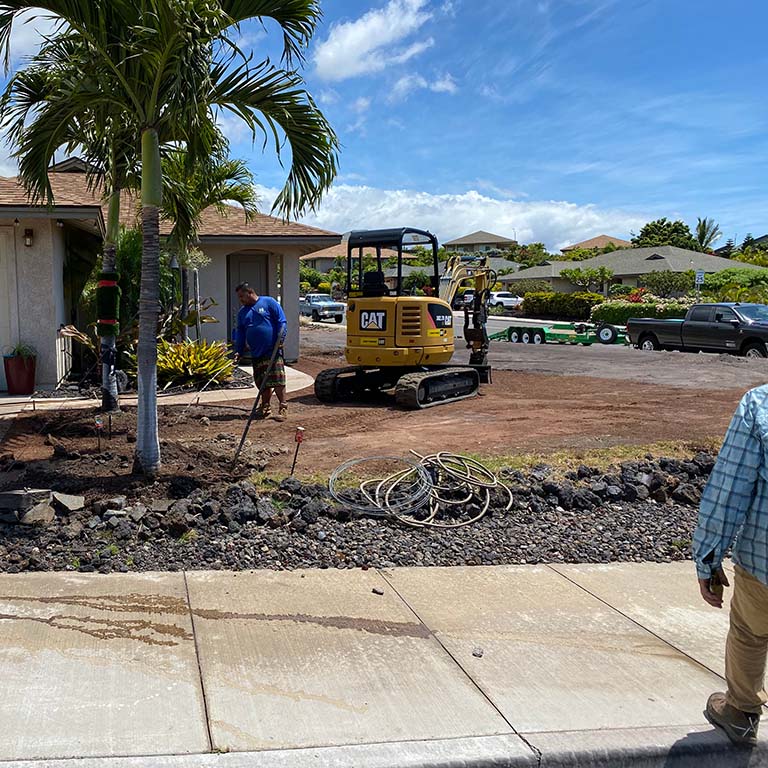Kona Landscaper providing big island excavation services during landscape project.