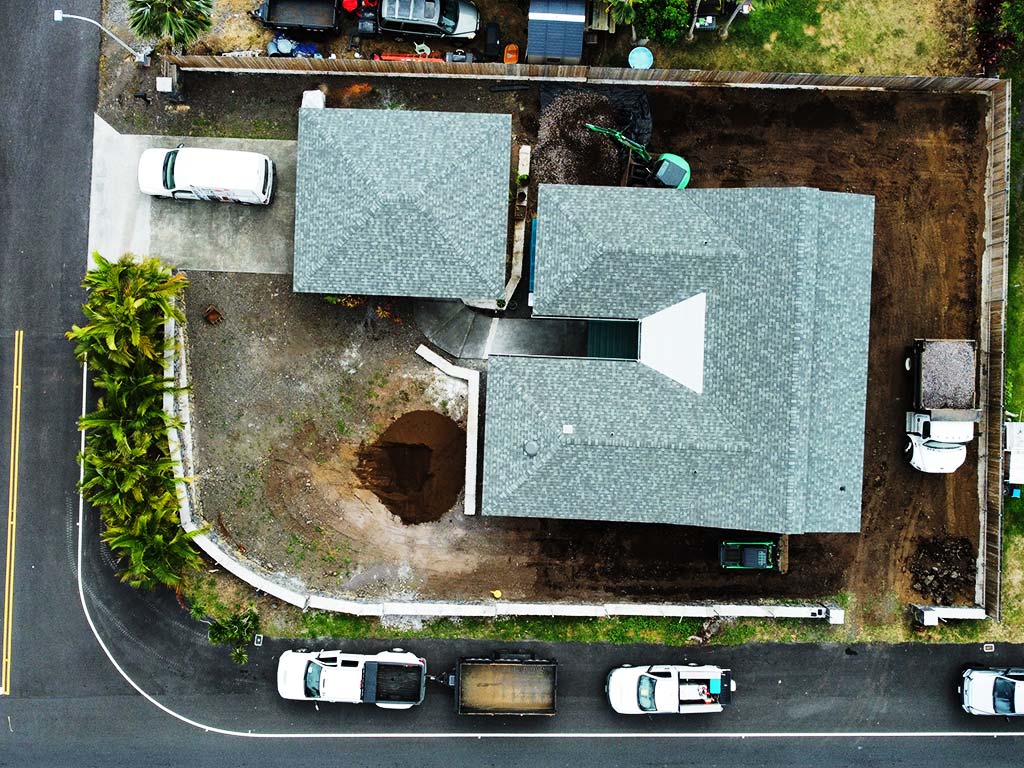 Aerial image showing backyard earthwork before turf installation, big island, Hawaii.