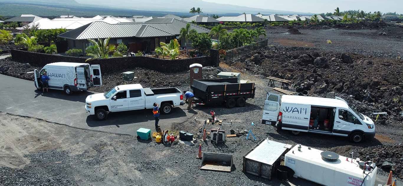 Hawaii Landscaping company vehicles staged near a project in Waikoloa.