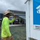 Big Island landscaper sprays lawn with Hydroseed mixture.